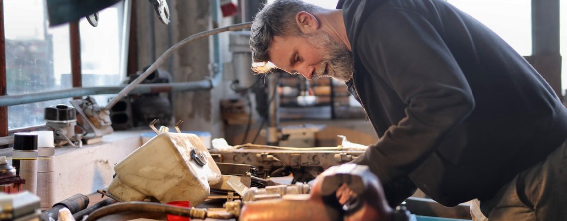 small business owner at his workbench