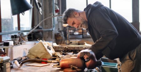 small business owner at his workbench