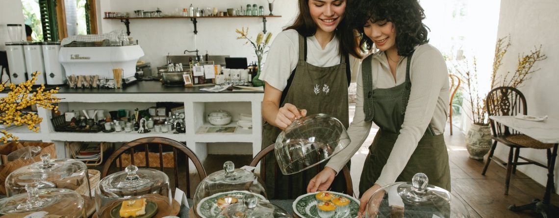 Two bakers working together