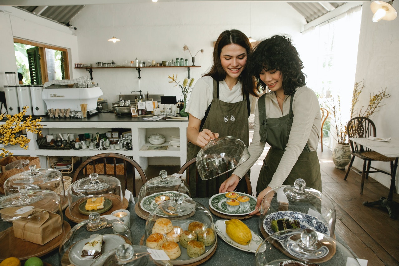 Two bakers working together